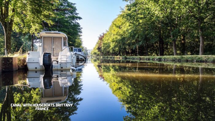 Canal with houseboats, Brittany, France