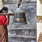 Buddhist Offer prayers to accumulate positive karma