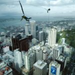 Bungee jump from the Sky Tower in Auckland New Zealand photo via Depositphotos