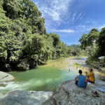 Overlooking the river from the waterfalls