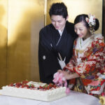 Japanese Bride and Groom cutting a wedding cake