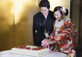 Japanese Bride and Groom cutting a wedding cake