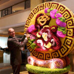 Manfred Weber, Area General Manager is pleased to show off this magnificent floral Monkey masterpiece in the Main Lobby to welcome the Year of the Monkey. A total of 16,888 chrysanthemums in various colours were used to depict a Monkey holding the peach of eternal life. This gigantic three-dimensional centrepiece was put together by the hotel's very own team of 13 artists and florists over two weeks.