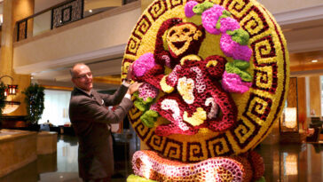 Manfred Weber, Area General Manager is pleased to show off this magnificent floral Monkey masterpiece in the Main Lobby to welcome the Year of the Monkey. A total of 16,888 chrysanthemums in various colours were used to depict a Monkey holding the peach of eternal life. This gigantic three-dimensional centrepiece was put together by the hotel's very own team of 13 artists and florists over two weeks.