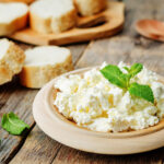 homemade ricotta with bread decorated with mint