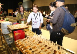 A young regional chef explaining eastern visayan cuisine ingredients to journalists at 2016 Madrid Fusion Manila