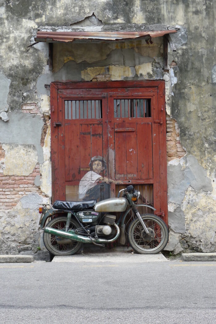 Boy on Motorcycle' street installation from Ernest Zacharevic
