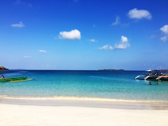 Cal means lime and agua/s is water in Spanish. It is apt if you look at the clear and azure waters of this place.