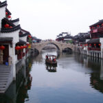 Shanghai still contains some picturesque historic rural suburban areas. Taken by Fanghong - Own work, CC BY 2.5