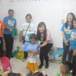 Hotel Jen Manila Executives take part in the school supply giving activity for Maytubig Day Care kids.
