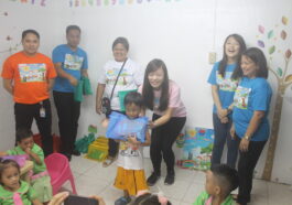 Hotel Jen Manila Executives take part in the school supply giving activity for Maytubig Day Care kids.