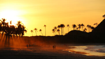 Mystical orange sunset in Nacpan Beach