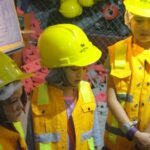 Future innovators listen keenly to instructions at the Construction Site