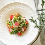 Chilled Seafood Salad, with baby squid, octopus, shrimp, and compressed watermelon drizzled with ginger-sesame dressing