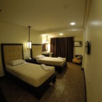 Interior of the Deluxe Room with twin beds