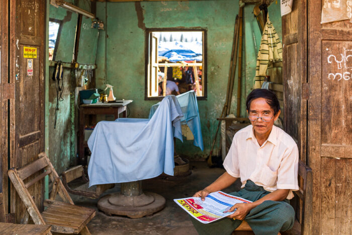 A barber shop in the Hleku street market along the road from Yangon to Bago