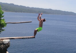 A commencing back-flip from the 9-meter board