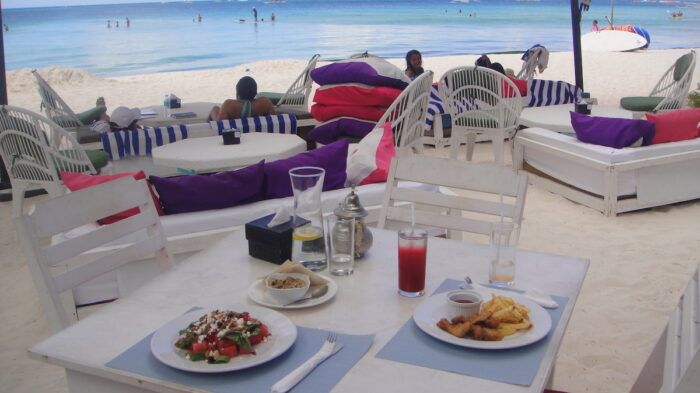 A sunny meal of Watermelon and Feta Salad, Fish Fingers with Fries and Hummus