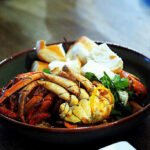One of the highlights of Singapore is eating its famous chili crabs. [Image Credit: insatiablemunch/Flicker]