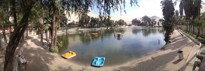 Huacachina is a desert oasis and tiny village just west of the city of Ica in southwestern Peru
