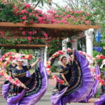 Folk Dancers in Nayong Filipino