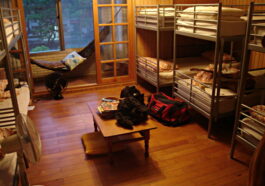 Hostels are inexpensive accommodations that will help you save a lot of money during your travels. [Image Credit: Wikimedia Commons]