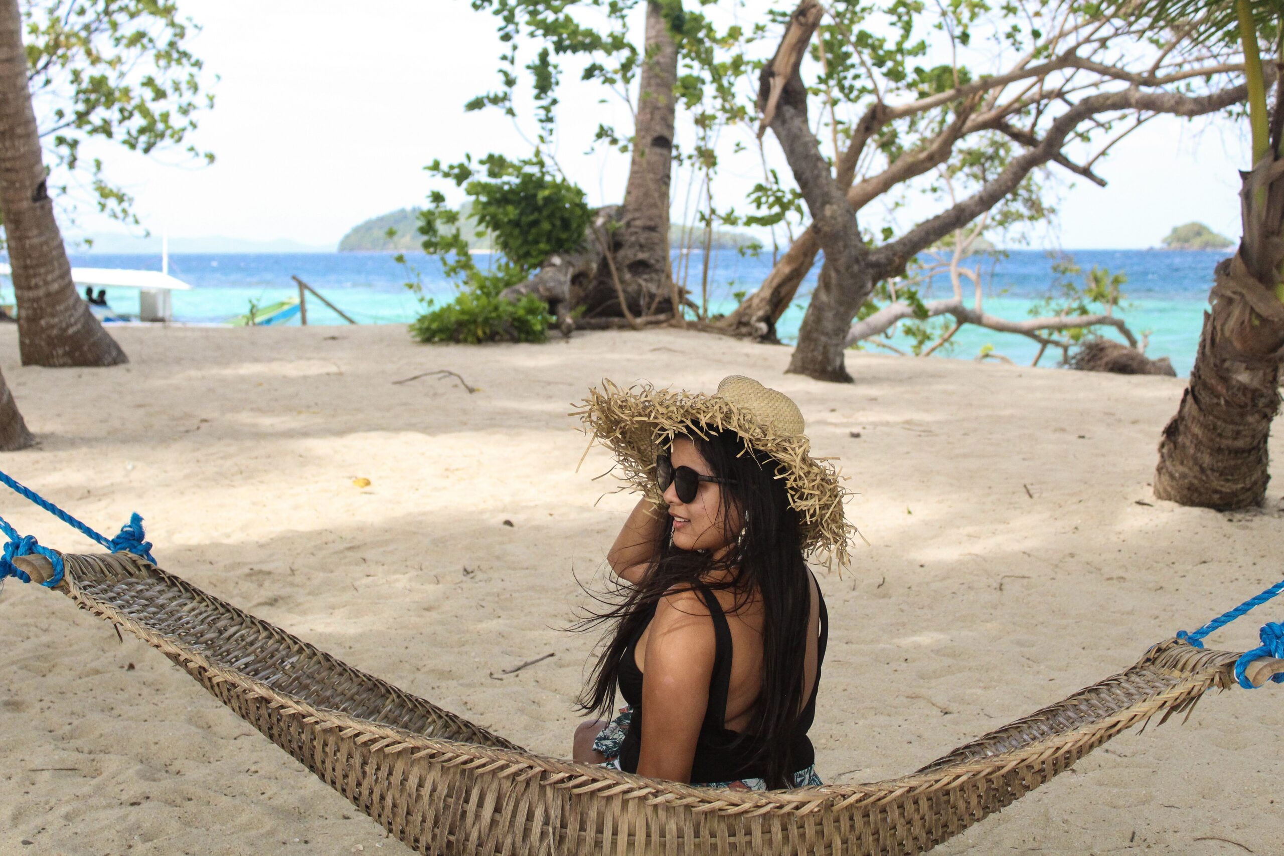 Here's Ms. Karla of karlaaroundtheworld sitting in the hammock.