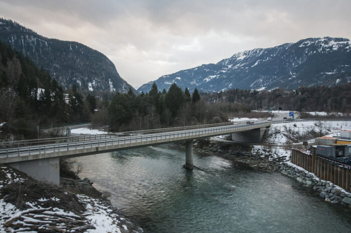 Bridge crossing over the Rhine as it meanders down to Germany.