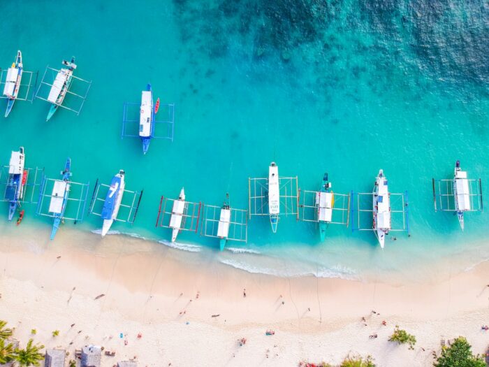 Island Hopping Tours in El Nido photo by Cris Tagupa via Unsplash