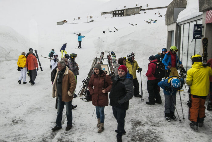 Skiers on the way to the resorts around OberAlp Pass.