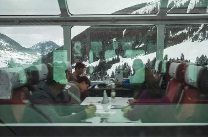The Glacier Express on its way to Zermatt passes by our local train.