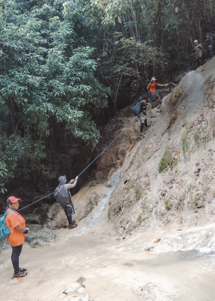 Rappelling down to Mahangin Falls
