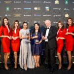 AirAsia Group Head of Cabin Crew Suhaila Hassan (centre left) and AirAsia Group Head of Communications Audrey Progastama Petriny (centre) accepted the World’s Leading Low-Cost Airline and World’s Leading Low-Cost Airline Cabin Crew awards from President & Founder of World Travel Awards Graham Cooke (centre right), flanked by AirAsia cabin crew.