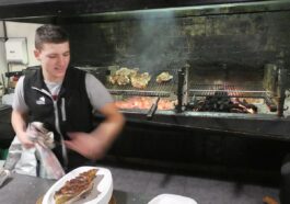 Action shot of the young chef (barely) grilling our steaks