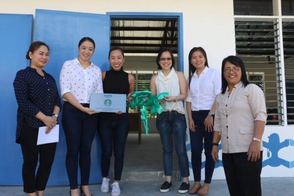 Friends of Hope, Starbucks and school officials lead the unveiling of the new classrooms. Photo shows (from the left) GenerationHope Inc Commerical Director Bambi Defensor, Starbucks Philippines marketing manager Jo-Ann Ramos, Starbucks Philippines category manager Jamie Silva, Starbucks Philippines assistant category manager for food Celine Lichauco, and AECMIS principal Felisa Cabaobas.