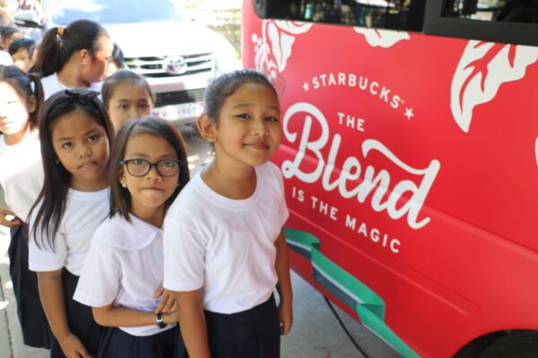 AECMIS students are excited to sample the Starbucks beverages prepared in the Starbucks Venti Van which visited their school in San Fernando, Pampanga.