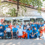 PPC officials, athletes and coaching staff together with TMP officials during the turnover of the Toyota Coaster donated by TMP to support the Paralympic movement in the Philippines.