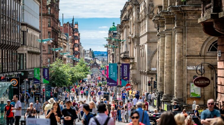 Sunny day on Glasgow Buchanan Street by Artur Kraft via Unsplash - Glasgow Travel Guide
