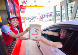 Another satisfied customer joyfully passing through the country’s 1st Dual Lane Drive Thru.