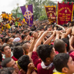Thousands of Catholic devotees join the procession of the life-size statue of the Black Nazarene during the annual procession in honor of the centuries-old icon of Jesus Christ.