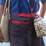 Mansalay Hanunuo Women wearing traditional woven cloth and woven bags