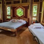 Master bedroom in one of the huts