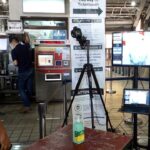 LRT-1 Security watches entering passengers on a thermographic monitor