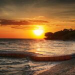 Sunset in Aliguay Island by rio Ubatay via Wikipedia CC