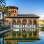 Alhambra patio with pool, Granada in Spain photo via Depositphotos.com