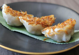 Pan-fried Minced Pork Chive Dumplings topped with Sakura Shrimp