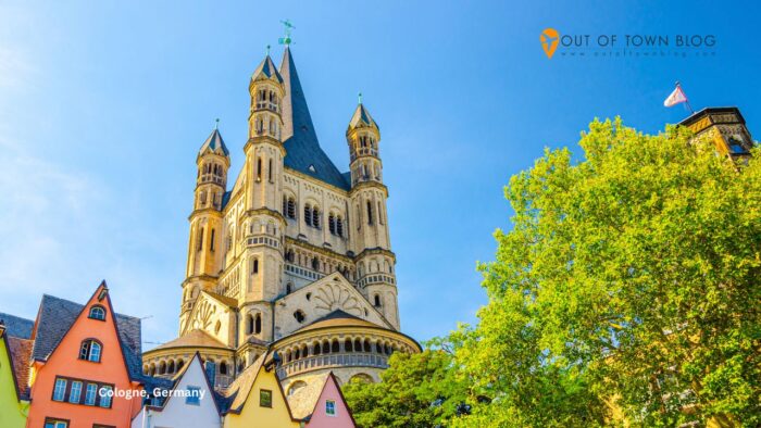 Colorful Houses and Church in Cologne, Germany