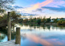 Sunset along the Waikato River in Hamilton, New Zealand photo via Depositphotos