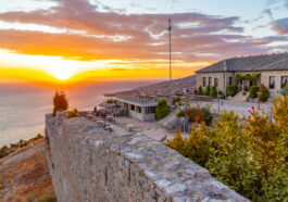 Sunset view of courtyard of Lekuresi castle at Sarande, Albania photo via Depositphotos