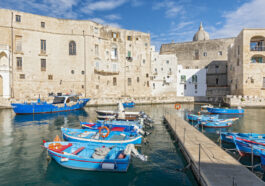 View of Monopoli harbor with fishing boats, Apulia, Italy. photo via Depositphotos